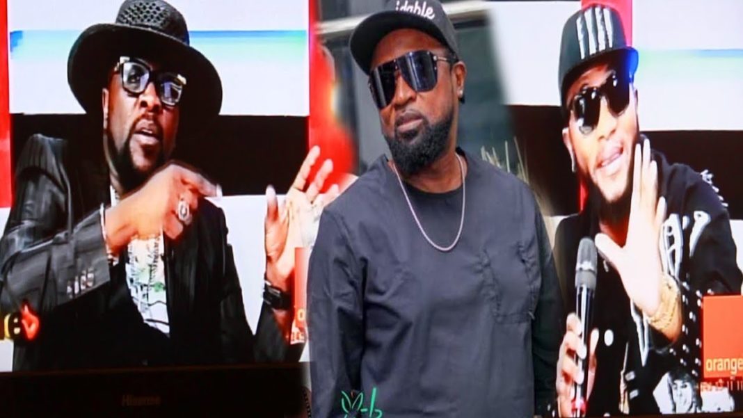 B-one Music : Cappuccino demande pardon à Werrason devant Papy Kakol et Papy Mboma B-one Music : Cappuccino demande pardon à Werrason devant Papy Kakol et Papy Mboma